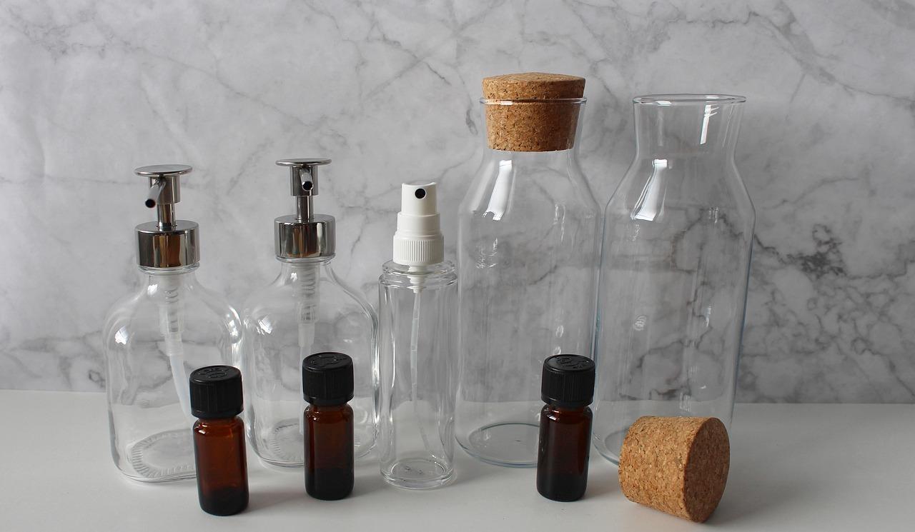 Empty glass and plastic containers for ant spray