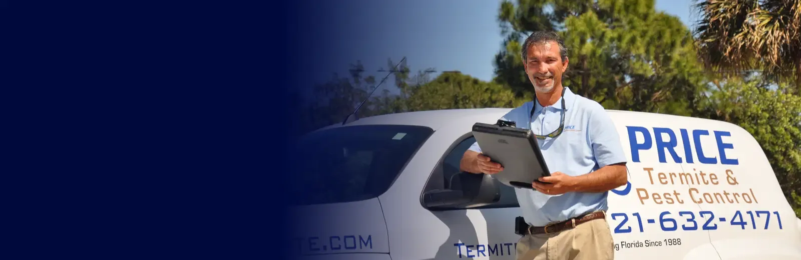 technician standing next to Price Termite and Pest Control Truck